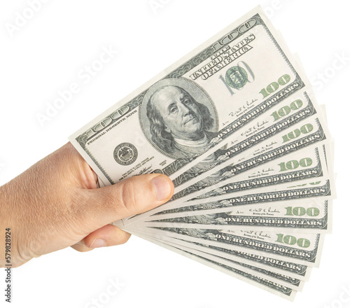 Hand holding several hundred dollar bills isolated