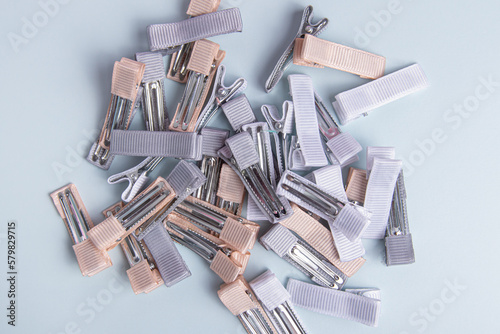 Wallpaper Mural Metal blanks for hairpins on blue background. Blanks for creativity. Crocodile hairpins. Handmade Torontodigital.ca