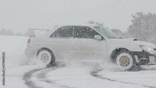 snow covered car drifting