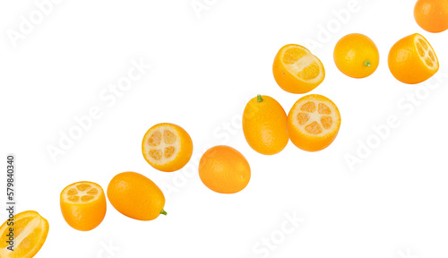 Perfectly retouched Cumquat or kumquat fly in space. Isolated on white