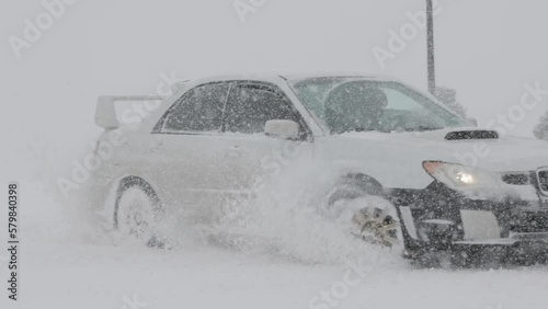 drifting car in snow
