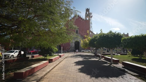 Slow push in to the San Juan Bautista Church In Motul Yucatan Mexico