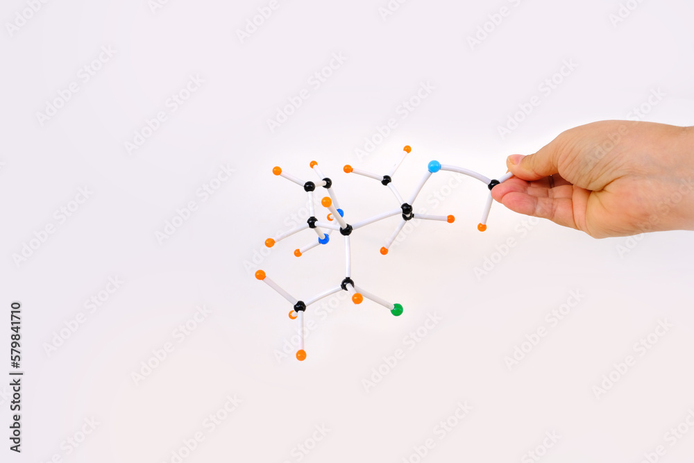 close-up of female scientist's hands holding of molecules and atoms in compound on light background, study human genome, concept chemical and physical properties of substances, scientific innovation close-up of female scientist's hands holding of molecules and atoms in compound on light background, study human genome, concept chemical and physical properties of substances, scientific innovation