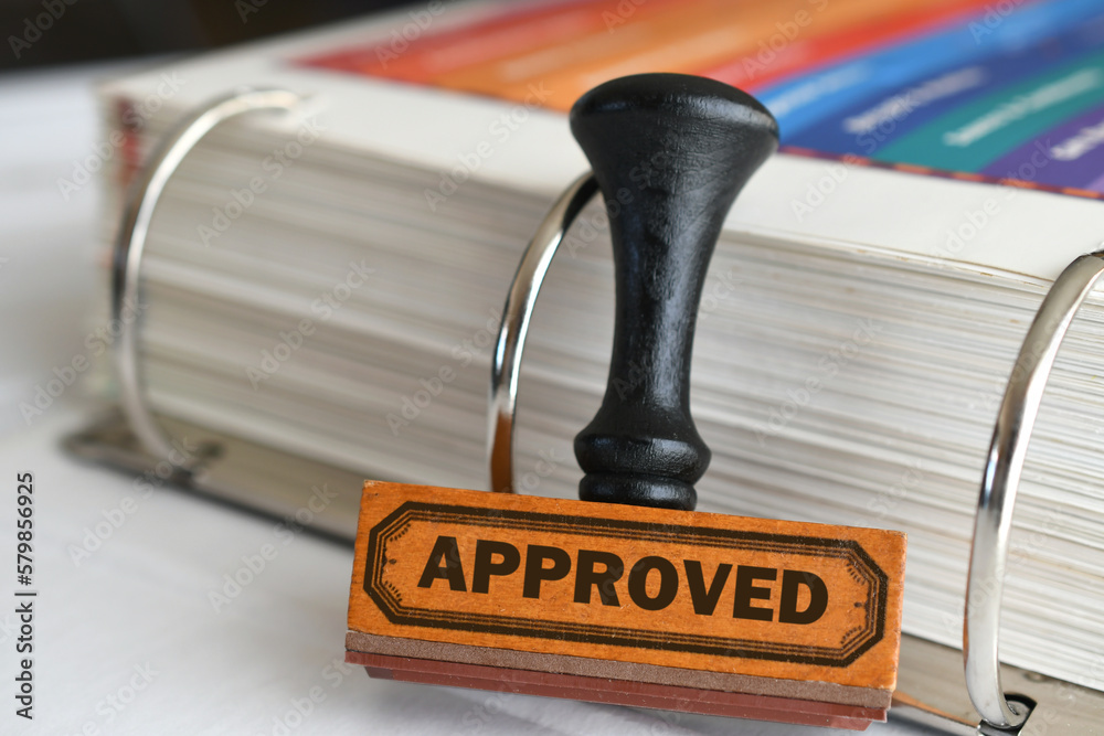 Rubber stamp with word Approved on it. Being accepted for a loan or application Rubber stamp with word Approved on it. Being accepted for a loan or application