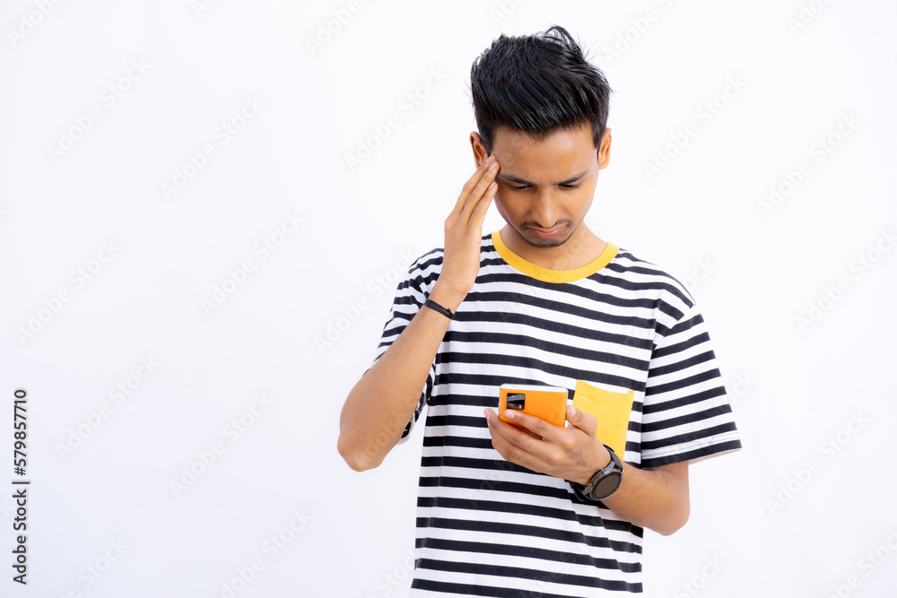 Stressed man looking At mobile, Man Headache looking at mobile Stressed man looking At mobile, Man Headache looking at mobile