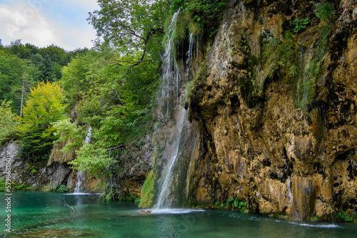 Plitvice  Croatia  View of the beautiful waterfalls of Plitvice Lakes in Plitvice National Park. Green foliage and turquoise water