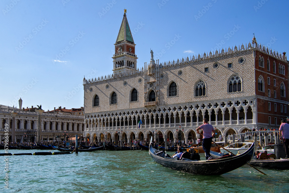 Venice, Italy - Gondoliers near Doge's palace and St Mark's Campanile