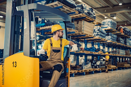 Warehouse man worker with forklift