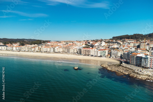 Fototapeta Naklejka Na Ścianę i Meble -  Aerial view of beautiful seaside city of Sanxenxo in Galicia, Spain. High quality photo