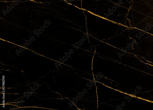 Pattern of black marble with gold natural veins.
