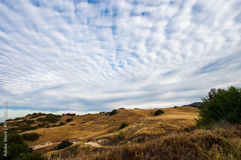 Fototapeta premium hilly landscape and clouds