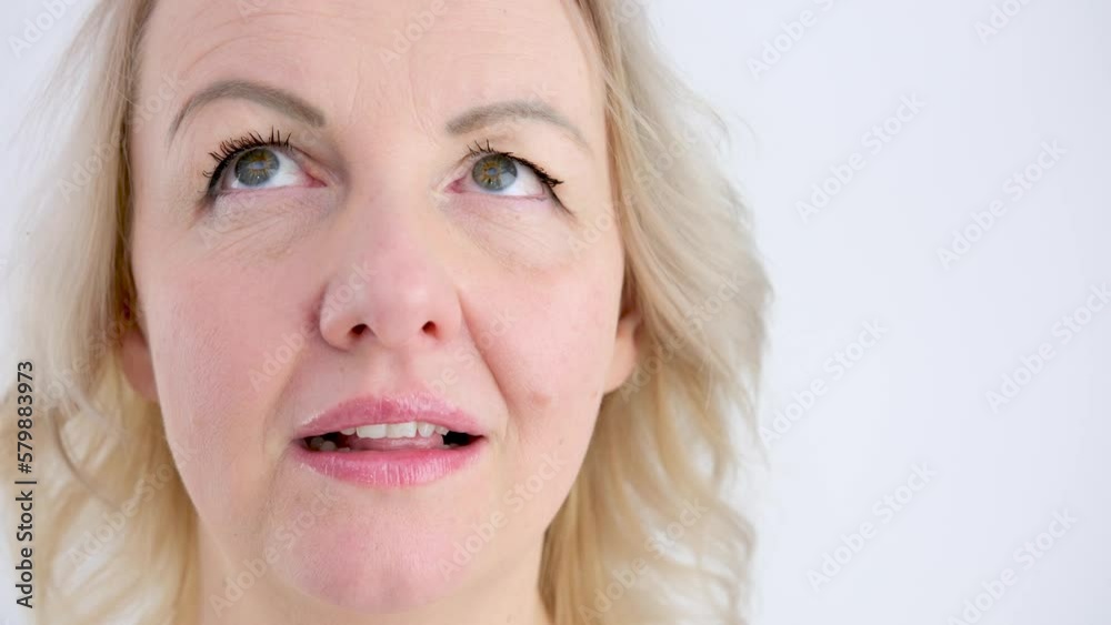 roll eyes up down right left woman face close up rest and relaxation