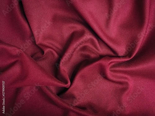 Fabric texture of natural cotton, wool, silk or linen textile material. Rose gold fabric background