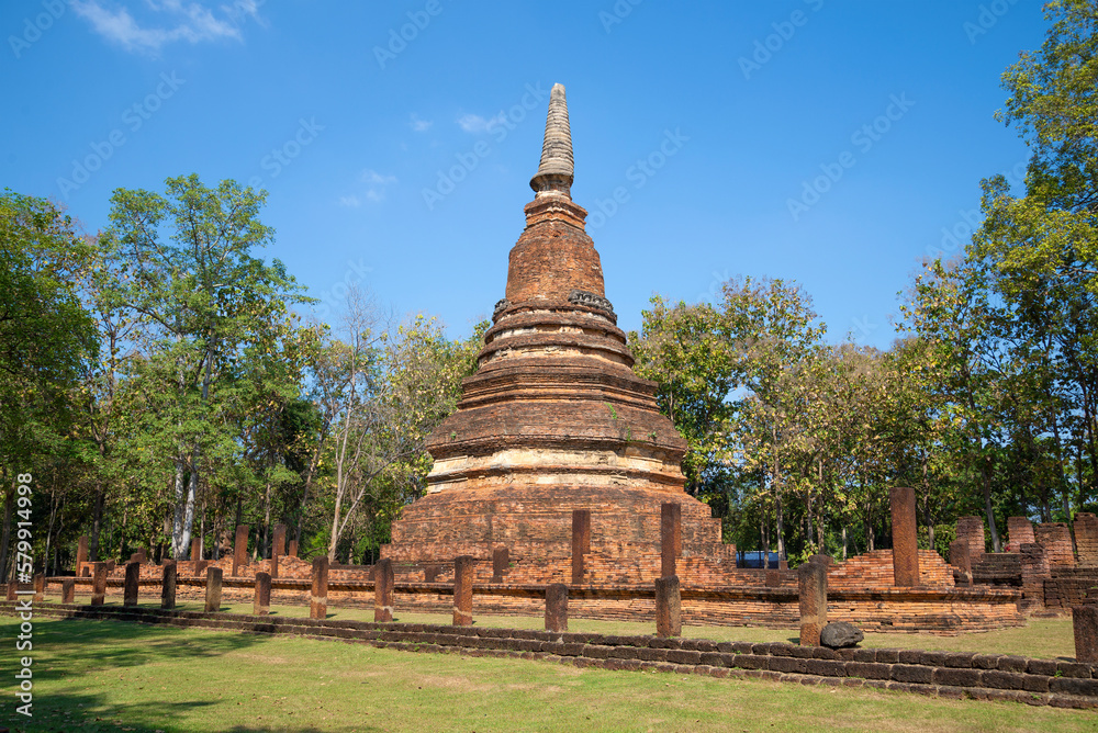 Ancient stupa on the ruins of the ancient Buddhist temple Wat Phra That on a sunny day. Kampaeng Phet, Thailand Ancient stupa on the ruins of the ancient Buddhist temple Wat Phra That on a sunny day. Kampaeng Phet, Thailand