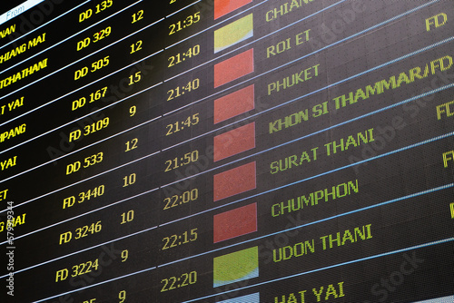 Flight itinerary at the airport information board