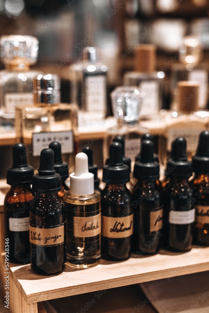 Mockup brown glass bottles with pipettes. Smell of essential fragrance oil. Perfume tester miniatures. Vertical Mockup brown glass bottles with pipettes. Smell of essential fragrance oil. Perfume tester miniatures. Vertical