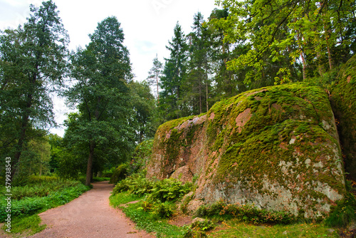 Huge boulders stones and path among pine trees, Park Mon Repos, Vyborg, Russia