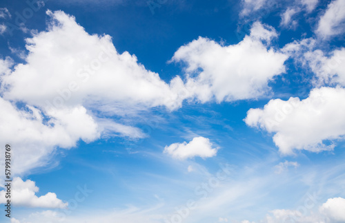 Fototapeta Naklejka Na Ścianę i Meble -  Blue sky background with awesome white clouds in the sunny day.