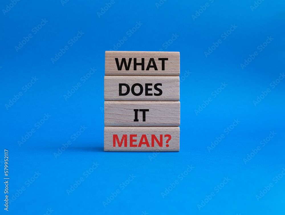 What does it mean symbol. Wooden blocks with words What does it mean. Beautiful blue background. Business and What does it mean concept. Copy space. What does it mean symbol. Wooden blocks with words What does it mean. Beautiful blue background. Business and What does it mean concept. Copy space.