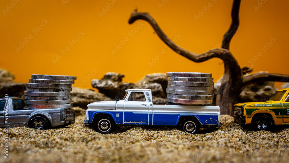 minahasa, Indonesia : January 2023, Toy car carrying coins