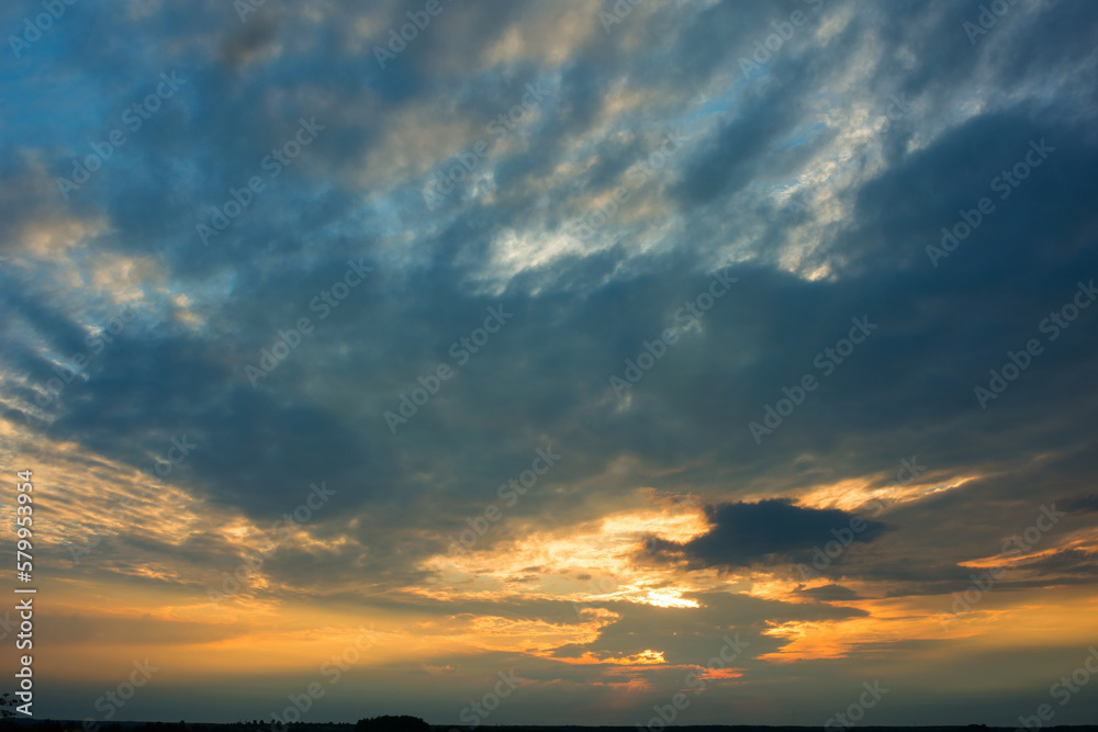 Fototapeta premium Bright dramatic sky with clouds at sunset