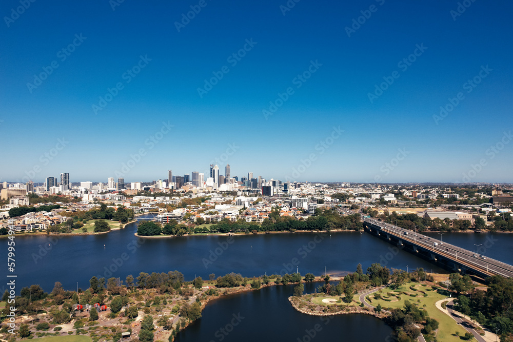 Aerial view across the Swan River of the Perth skyline and city centre 