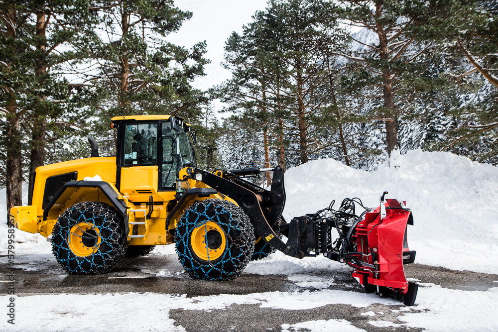 Snow plow ready to intervene on mountain roads Snow plow ready to intervene on mountain roads