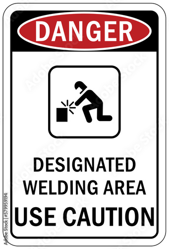 Welding hazard sign and labels designated welding area. Use caution