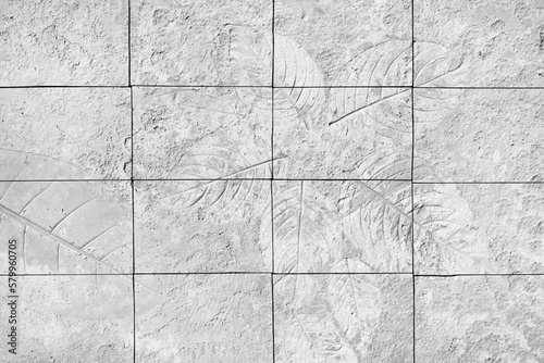 tiles wall of marks leaf or marks of leaf on the concrete wall texture background.