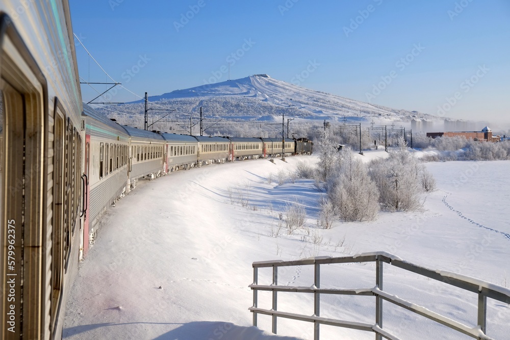 Obraz premium Polar Express in Kiruna in winter scenery. Kiruna is city with iron ore mine. Sweden, Arctic Circle, Swedish Lapland
