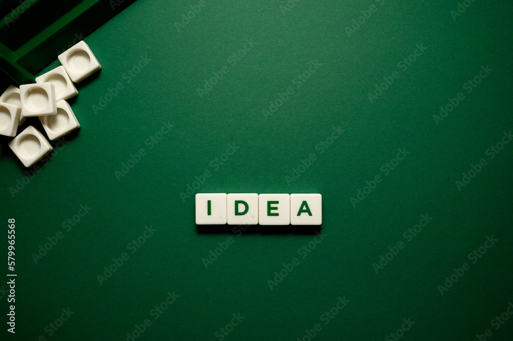 Fototapeta premium the word idea is composed of letters on a green background. Creativity inspiration ideas concept and innovation concept