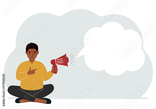 A man with a mouthpiece in his hand sits cross-legged. From loudspeaker bubbles to accommodate text.