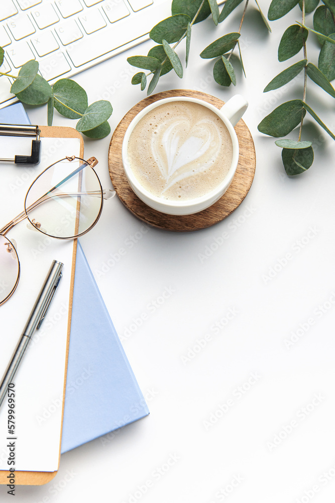 Modern white office desk table with laptop, notebook and other supplies. Modern white office desk table with laptop, notebook and other supplies.