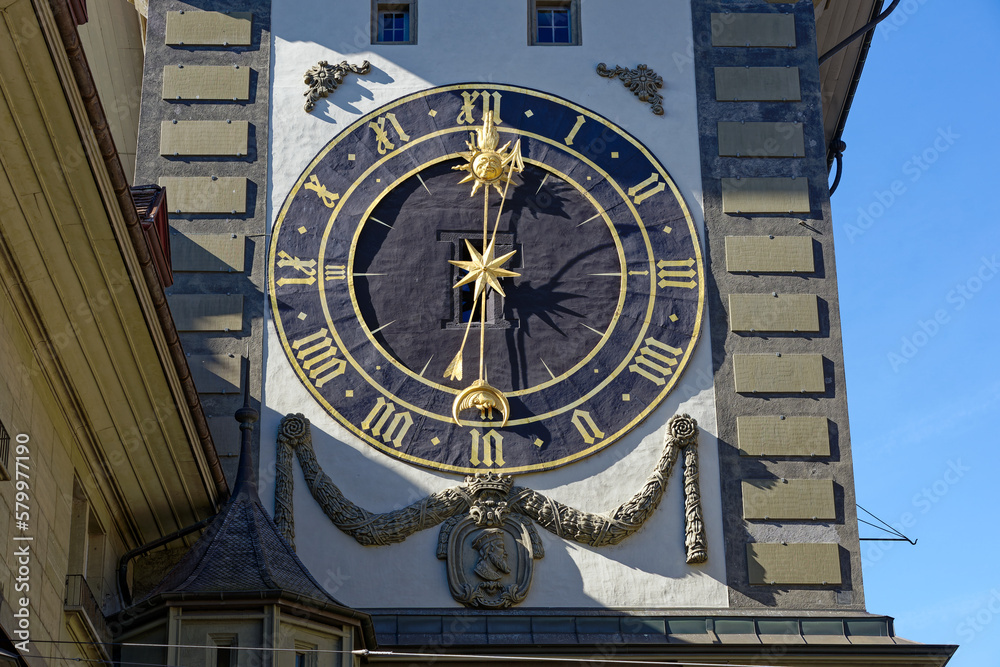 Clock tower with clock face named Zytglogge at the old town of Bern on a sunny winter day. Photo taken February 21st, 2023, Bern, Switzerland. Clock tower with clock face named Zytglogge at the old town of Bern on a sunny winter day. Photo taken February 21st, 2023, Bern, Switzerland.