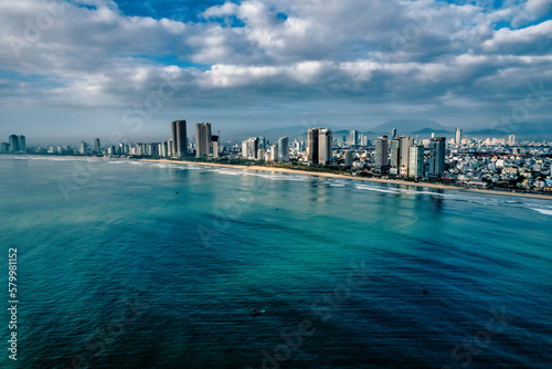 Coastline of Da Nang Vietnam in the morning, skyscrapers with clouds in the sky and stunning blue green color in the sea  © Hanjin