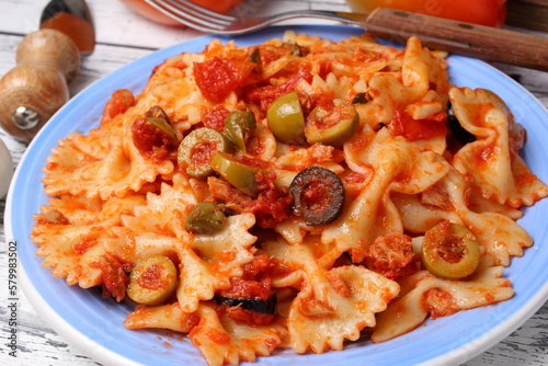 Tasty plate of farfalle pasta with puttanesca sauce.
