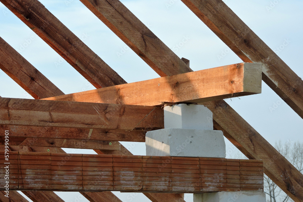 Wooden rafters and a wall plate, walls made of autoclaved aerated