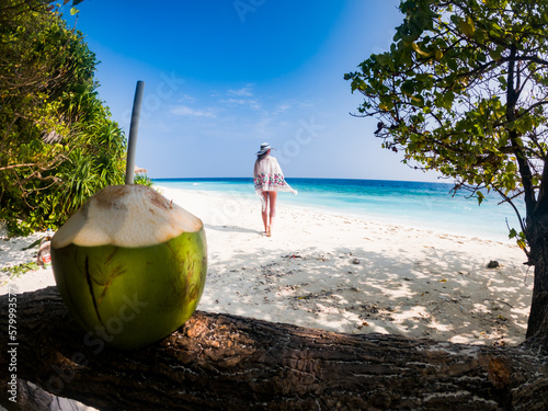 beautiful woman relaxing on a tropical beach