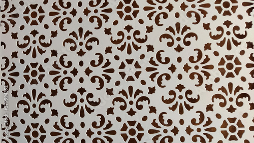 Abstract pattern on white plastic. Background. Texture. Abstract drawing for background and texture. Stencil for drawing with a pattern of flowers