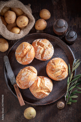 Tasty and fresh potato buns baked in bakery.