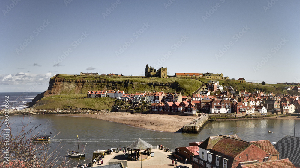 Aerial panorama of town, beach and abbey at Whitby