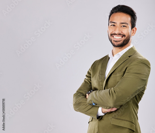 Mockup, business and portrait of man with smile on white background for success, leadership and confidence. Copy space, crossed arms and happy male in professional clothes for advertising in studio