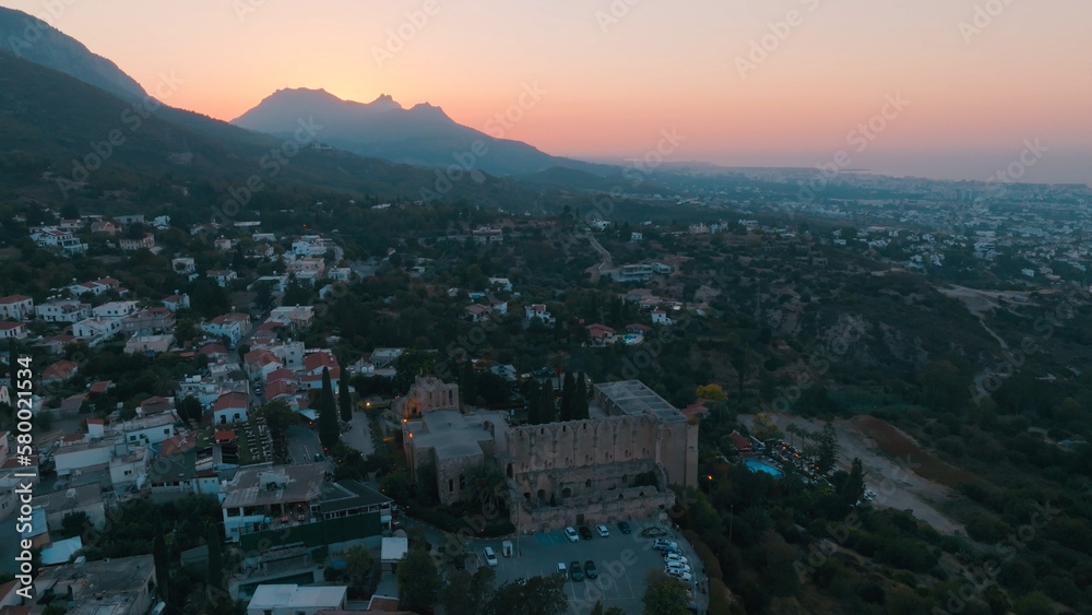 Obraz premium Bellapais Monastery aerial sunset view in Bellapais village, North Cyprus
