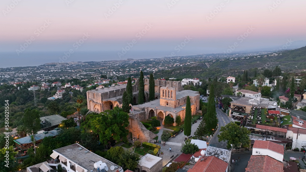 Bellapais Monastery aerial sunset view in Bellapais village, North Cyprus