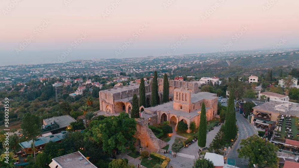 Bellapais Monastery aerial sunset view in Bellapais village, North Cyprus