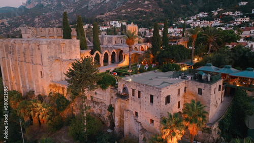 Bellapais Monastery aerial sunset view in Bellapais village, North Cyprus photo