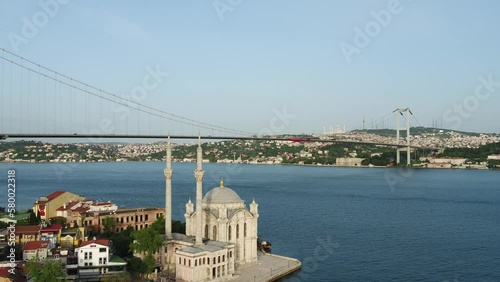 View of the mosque, the bosphorus and the bridge by the sea in Istanbul, Turkey photo