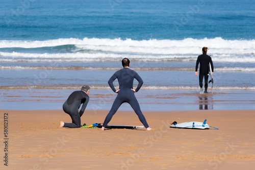Surfers preparing to enter the sea