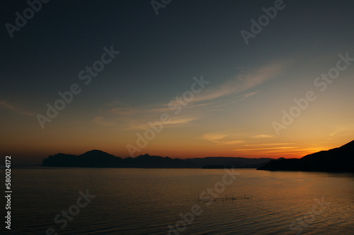 Sunset moody night seascape with a view on the bay.