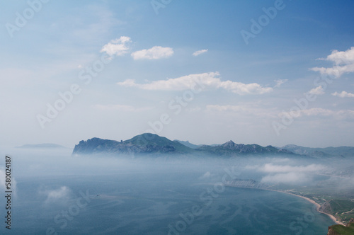 Landscape with sea bay and mountain view. © luengo_ua